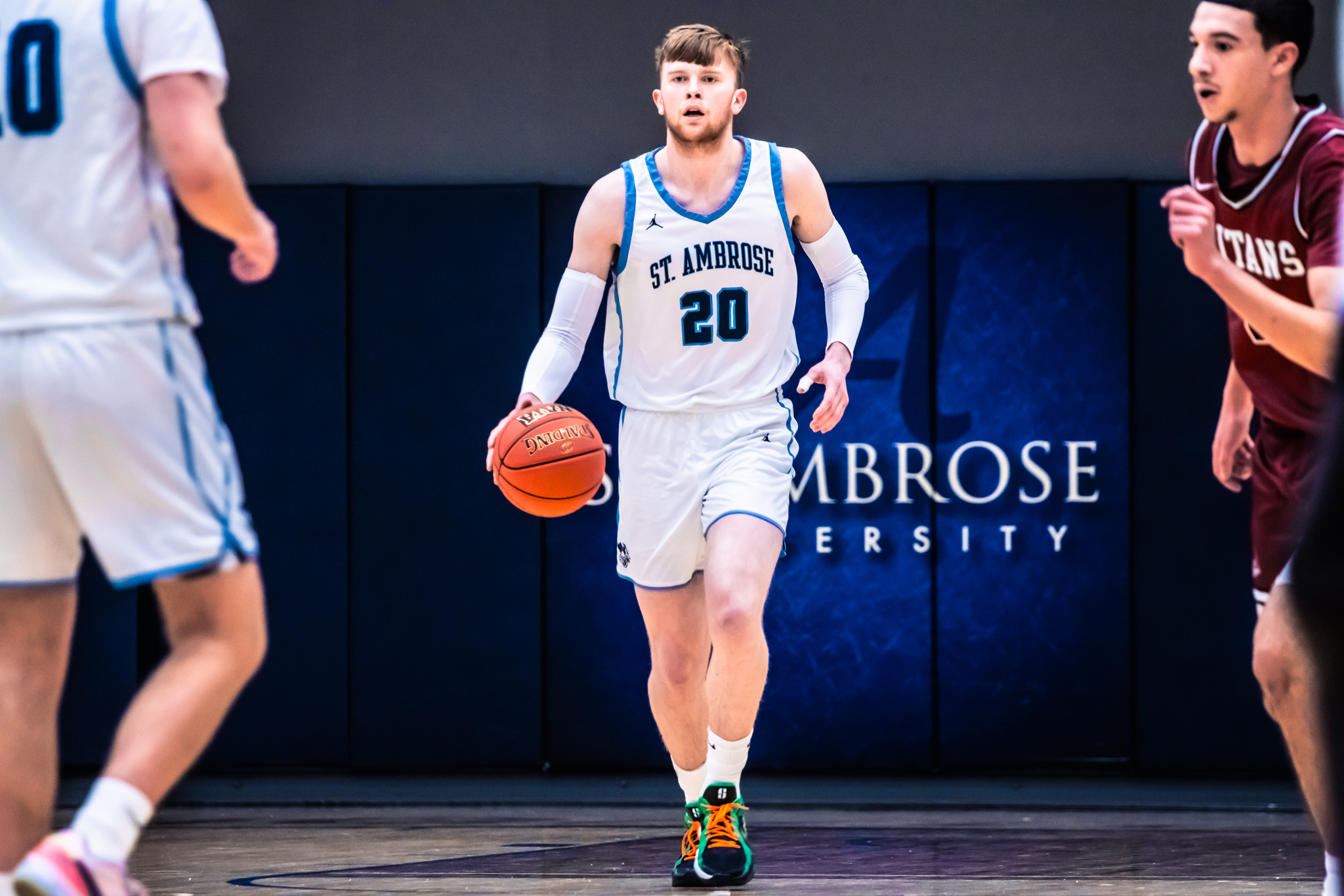 Hot-shooting St. Ambrose holds off Simmons 89-84